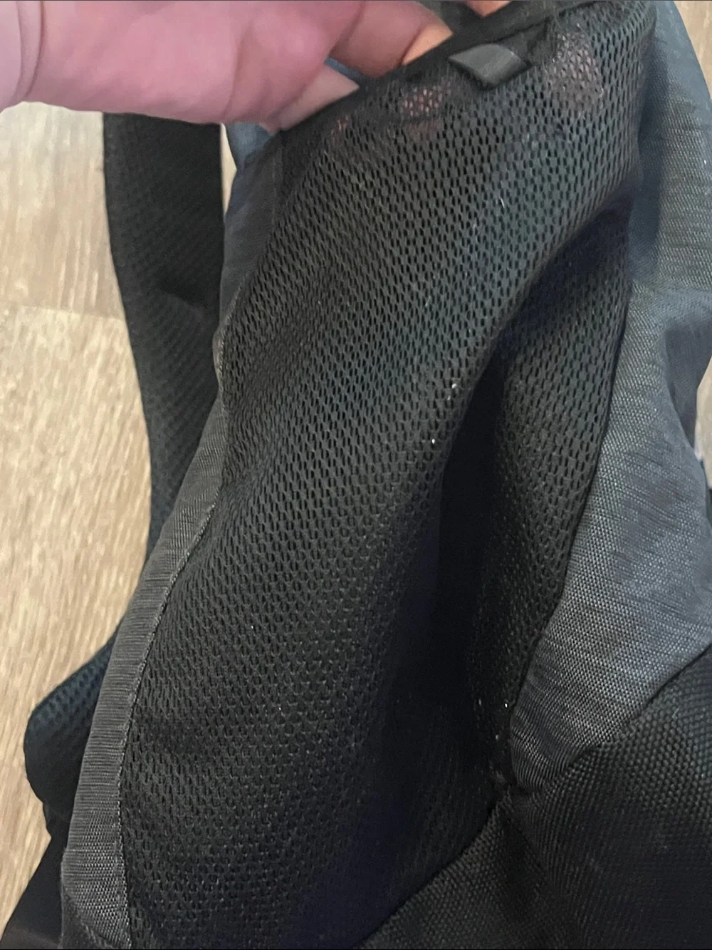 The NorthFace Jester Black Backpack with Light Pink Bungee Cord